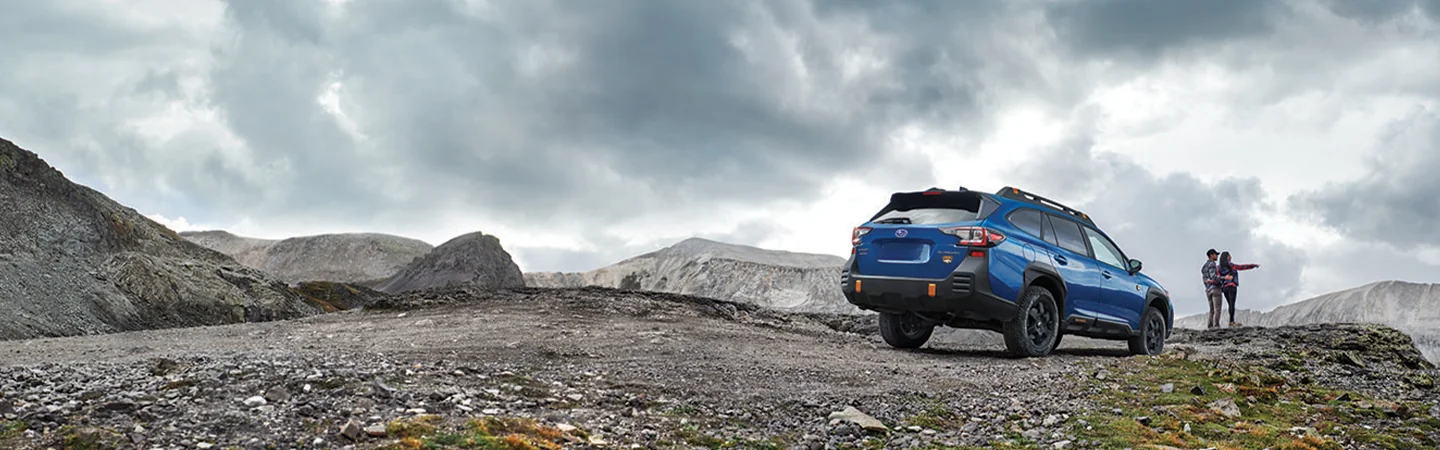 2025 Subaru Outback Specs blue color back side view