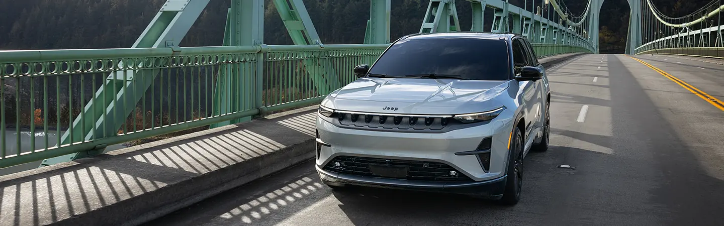 2025 Wagoneer S Sliver color car front view running on bridge