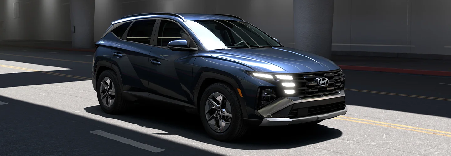 A parked black 2025 Volvo S90 Hybrid in front of some stairs