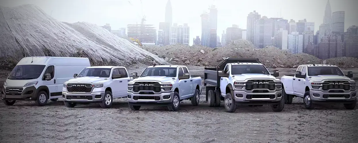 A car salesman showing a truck to a customer