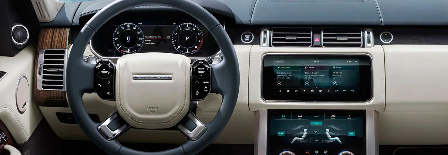Interior dash and steering wheel view of the 2020 Range Rover