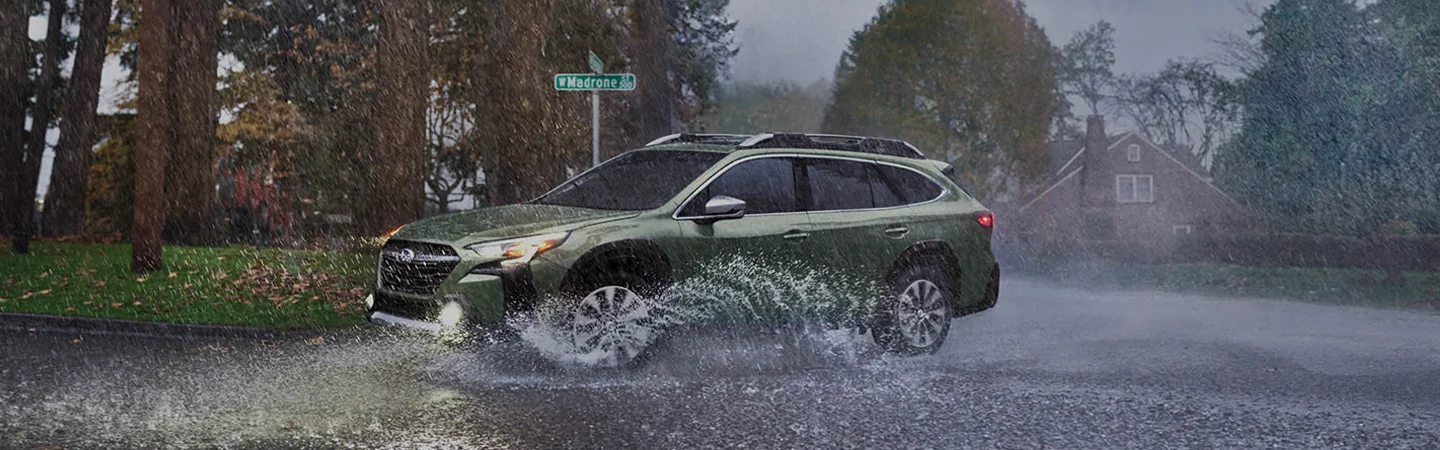 2025 Subaru Outback Touring driving in rain