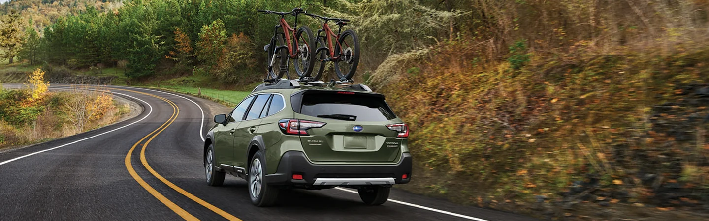 2025 Subaru Outback Touring with 2 bikes racked on top