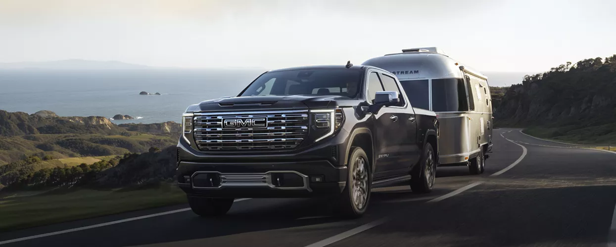 GMC Truck towing a trailer