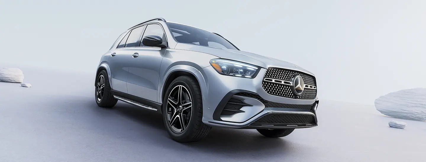 Close up of the front side of a 2025 Mercedes-Benz GLE Coupe in a gray room
