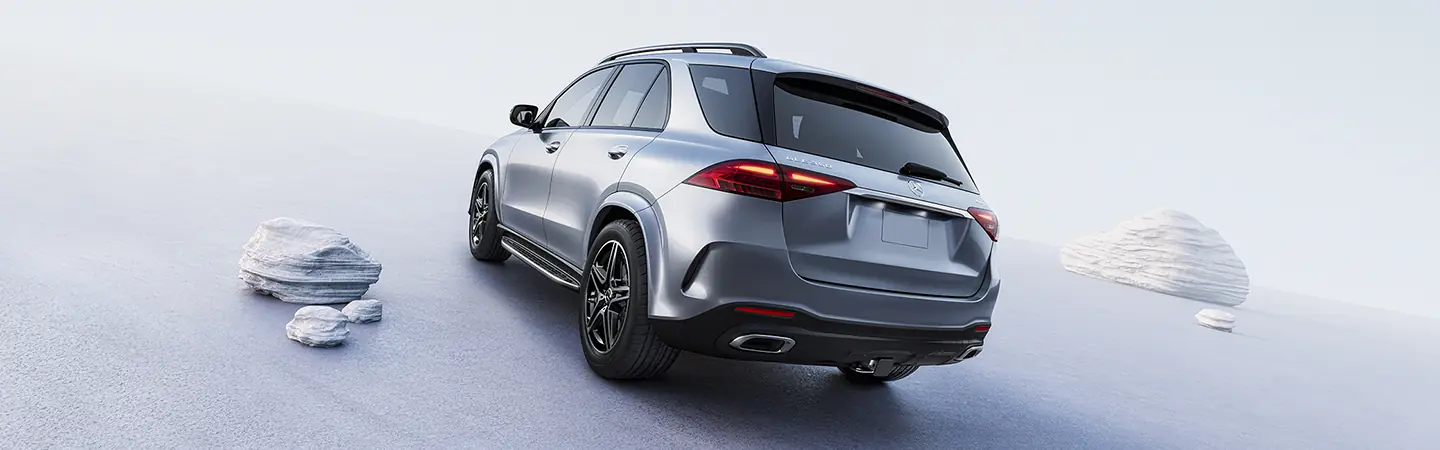 Back view of a parked 2025 Mercedes-Benz GLE Coupe in a gray room