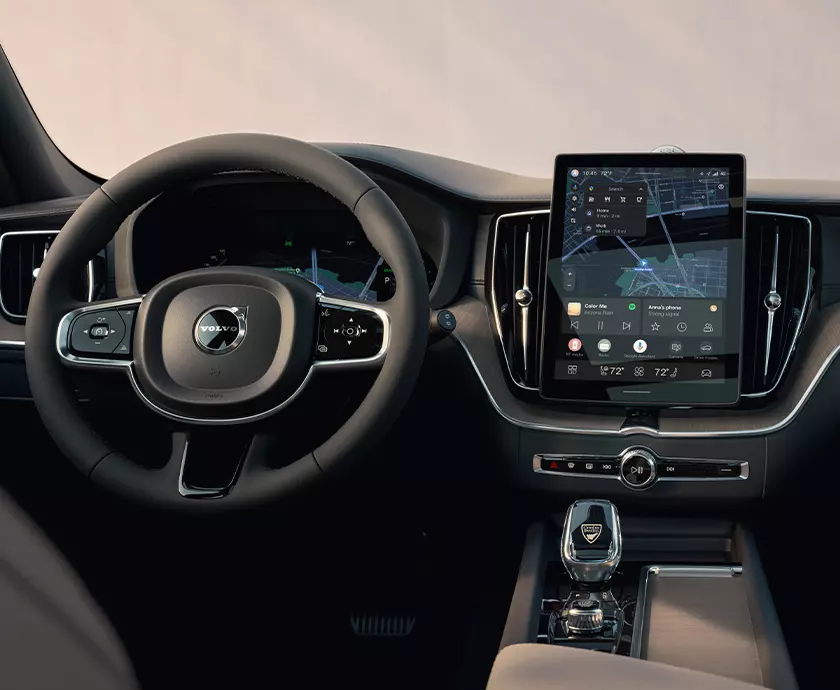 view of a silver Volvo X60 interior showing the front seating area
