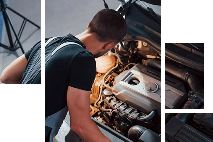 BMW service tech looking over an engine
