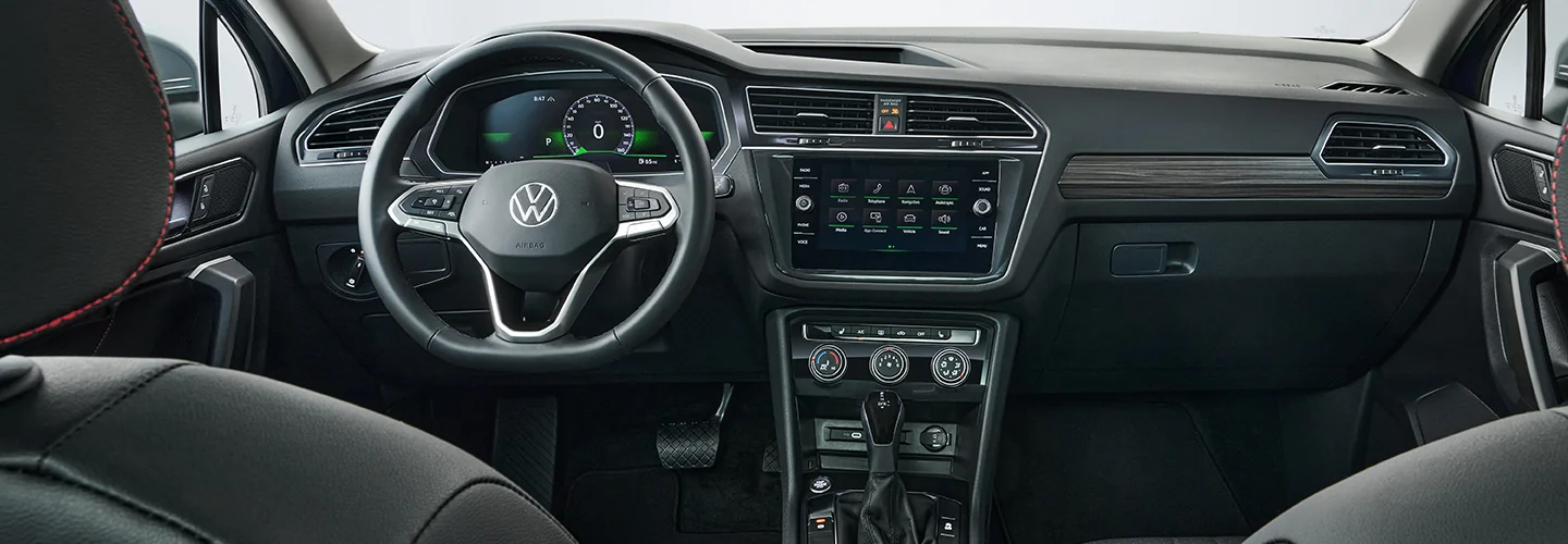 Interior view of the dashboard and tech of a 2025 Volkswagen Tiguan