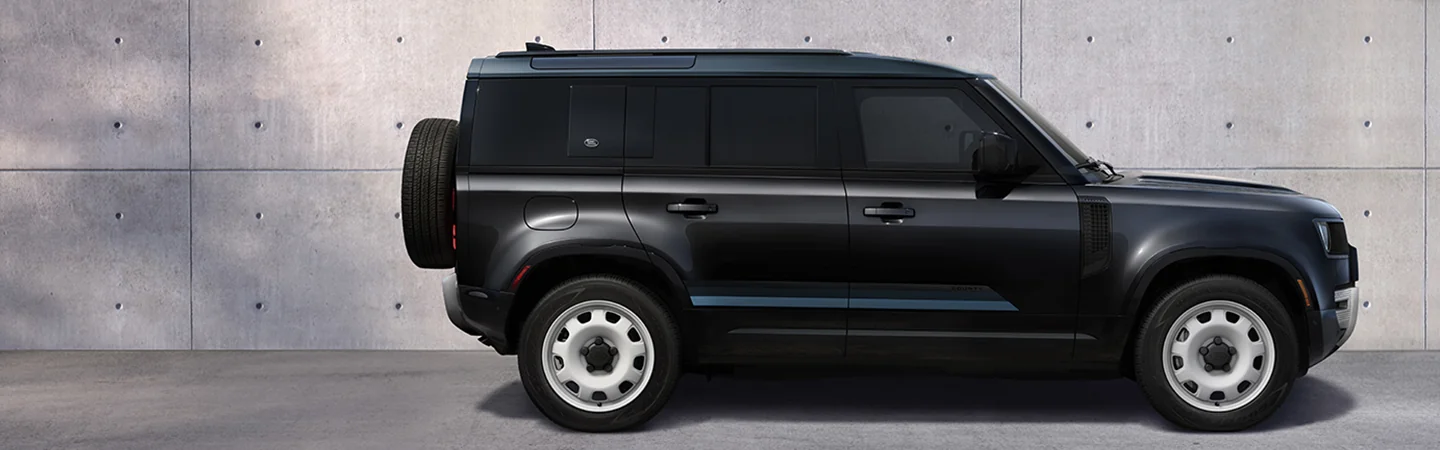 Side view of a parked 2025 Defender 110