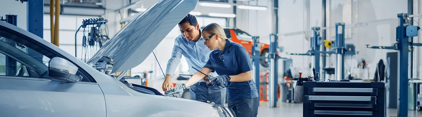 Service technicians check oil at Villages Subaru in Leesburg, FL