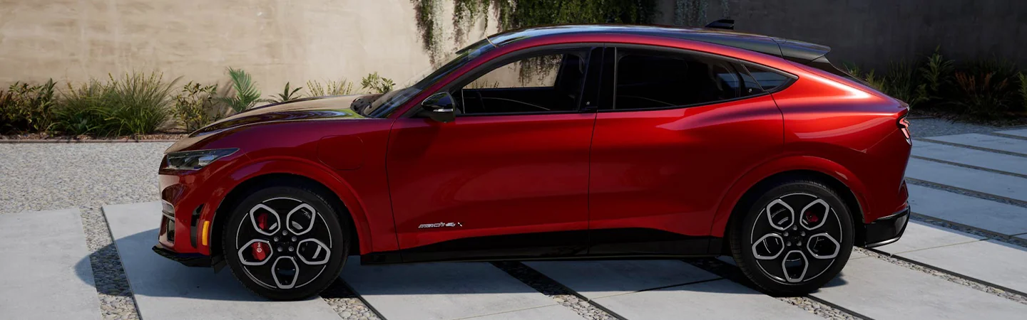 2024 Kia EV6 vs Ford Mustang Mach-E red color and side view