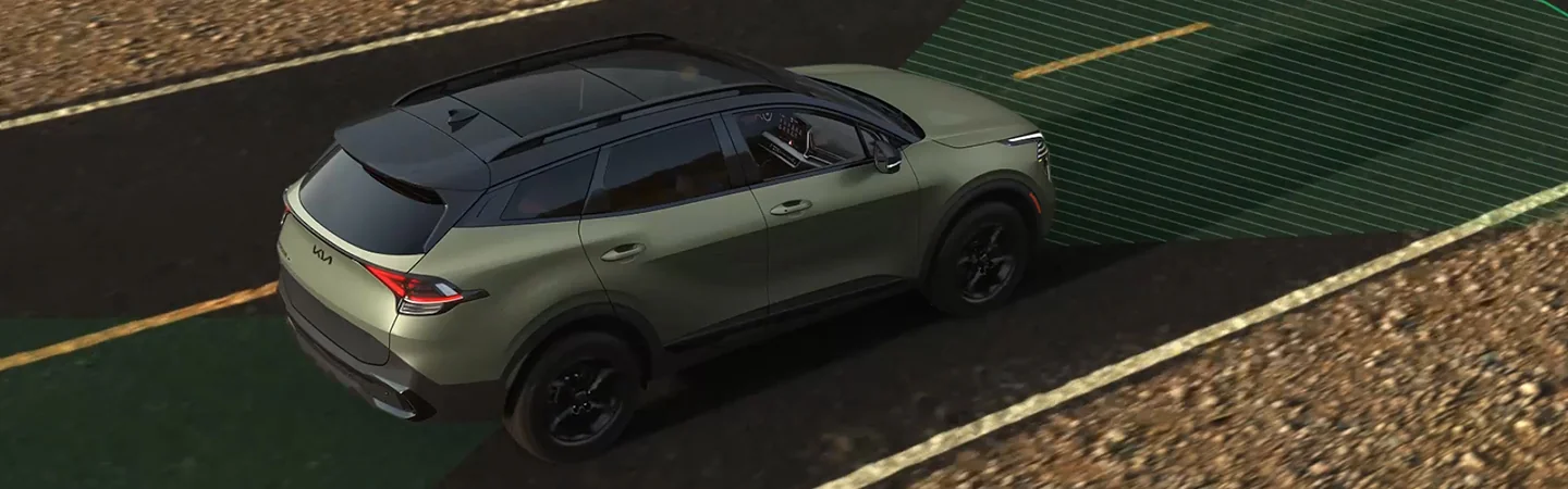 Top view of a parekd 2025 Kia Sportage on a road