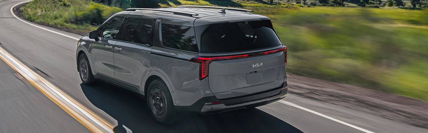rear view of a gray 2026 Kia Carnival LX