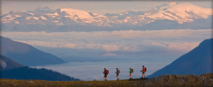 Heli-Hikers on Ridge - above the clouds