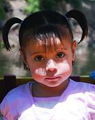 Child_on_river_boat