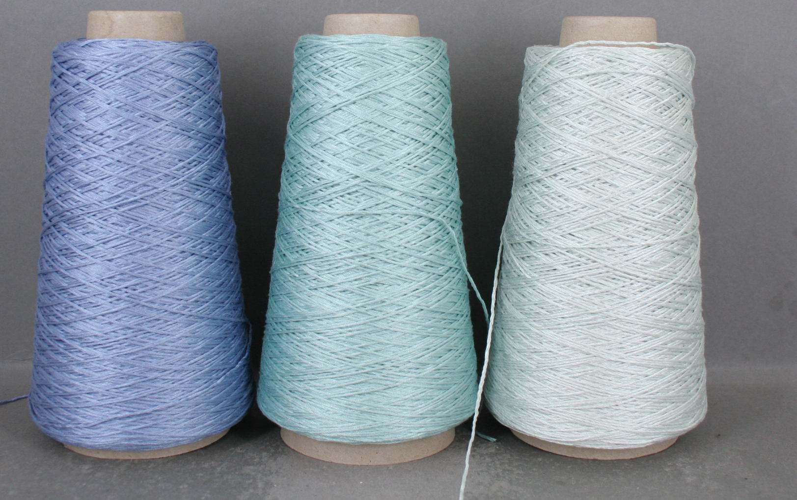 silk yarn, dk weight, on 3 cones, 450g (1lb), 1500 yds total, glacial