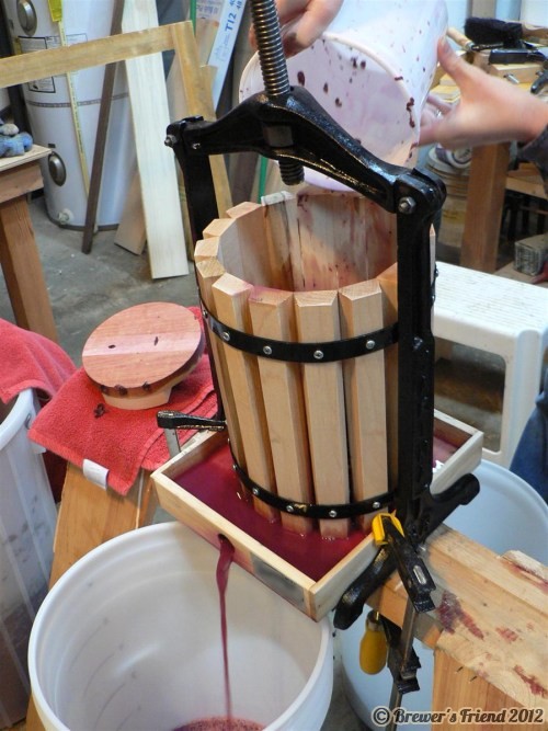 wine press in action