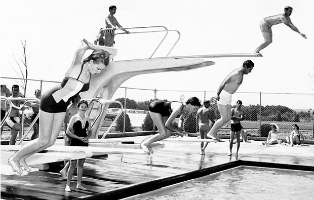 This 1958 photo shows swimmers ready to dive into the swimming pool at Wedgewood Village Amusement Park, 4500 Northwest Expressway. 