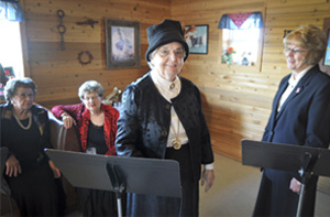 'Beer City Gals' cast members start to set up before their performance.