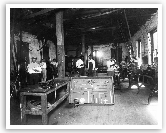 One of the early industrial shop classes at Langston University. The college started with four teachers, 41 students and 40 acres of land; within eight years, it had grown to 15 teachers, 160 acres and a main building that could hold 500 students. The university's fortunes wavered over the years, but it is now a vital school with a student population of about 4,000.