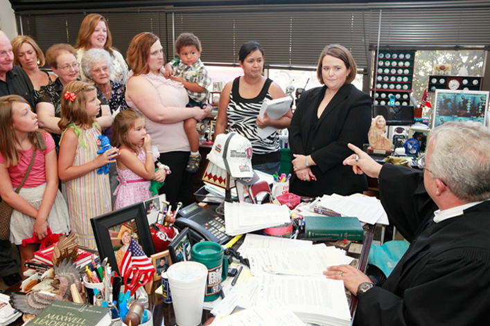 Judge Kirby performs the Adoption Ceremony for Darlin' and Biggin' and mother Michelle Kelley, Thursday, July 28, 2011. The children were in foster care for several years and are now being adopted by the single mother at the Oklahoma County Juvenile Justice Center, 5905 Classen Boulevard, in Judge Kirby's chambers.