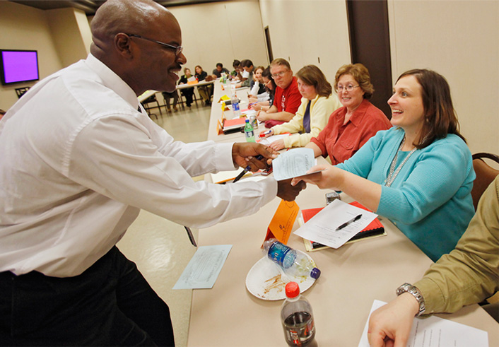 Michelle Kelley is presented her completion certificate after finishing the required DHS parenting class on Thursday, Feb. 12, 2009.