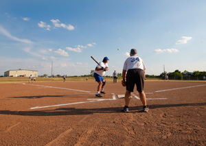 Cletus Price bats during a game at the Plex in Oklahoma City, July 19, 2011.