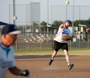 73-year-old Fred Jones (1) throws a ball from third base during a game at the Plex Sports Complex in Oklahoma City, July 5, 2011. 
