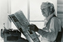 Bob Barton reading the paper