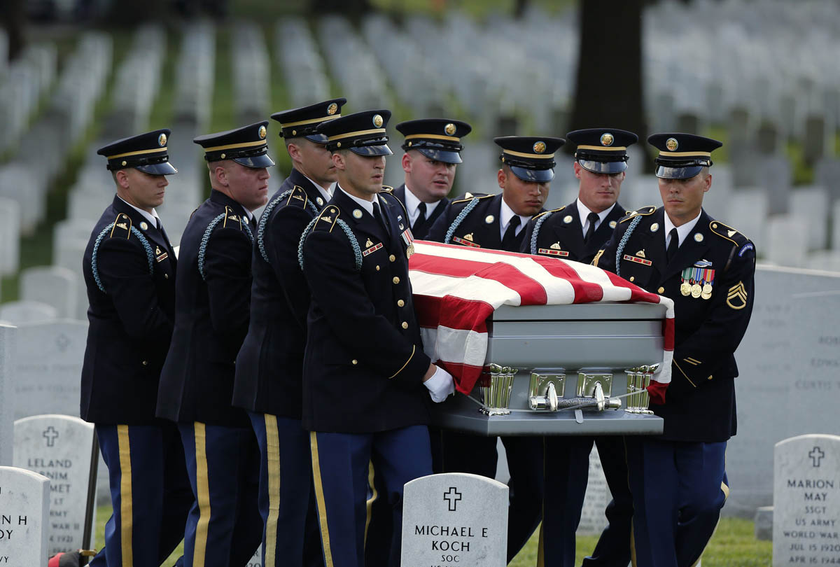 Military pallbearers carry the casket of U.S. Army Maj. Gen. Harold J