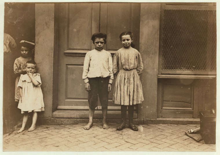 Marie and Albert Kawalski. 615 S. Band St., Baltimore, Md. Albert is 10 and Marie 11 years old. They worked, with mother, last winter, shucking oysters for Varn & Beard Packing Co., Young Island, S.C. (near Charleston). Mrs. Kawalski did not have things represented to her correctly and she found that all the children that had fare paid were compelled to work for the company. Other smaller children worked some and went to school some. Maire and Albert have worked several summers in the berry, beans and tomato fields packing houses near Baltimore. (see my report, July 10, for further [particulars]). Location: Baltimore, Maryland. 1909 July. (Lewis Hine/Photo courtesy LOC)