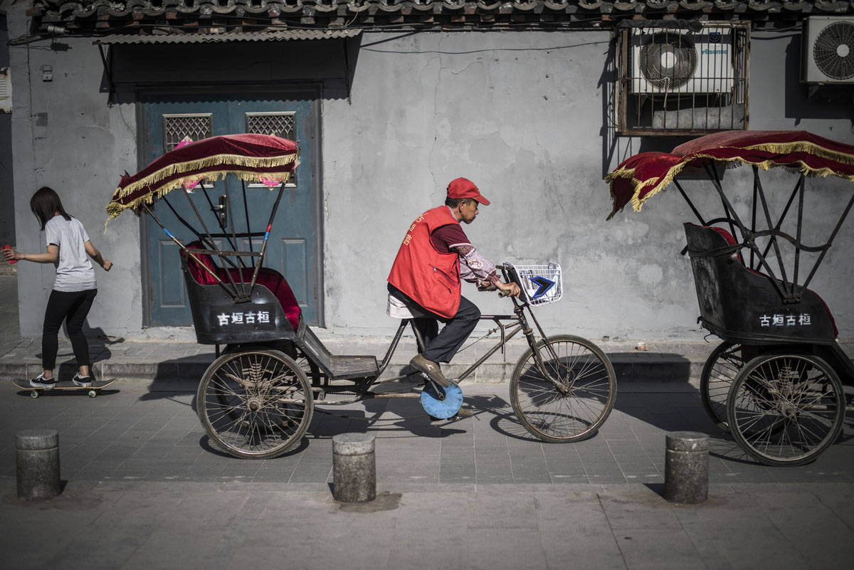 Modern rickshaw drivers in China