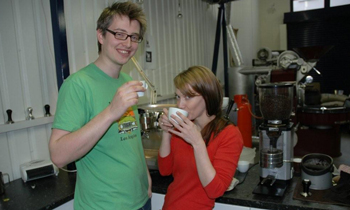 current World Barista Champion, James Hoffman and Head Trainer, London School of Coffee, Anette Moldvaer enjoy a coffee from their Synesso current World Barista Champion, James Hoffman and Head Trainer, London School of Coffee, Anette Moldvaer enjoy a coffee from their Synesso