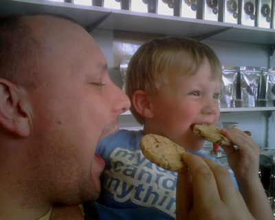 Brett and son Ben enjoy a home-made biscuit Brett and son Ben enjoy a home-made biscuit