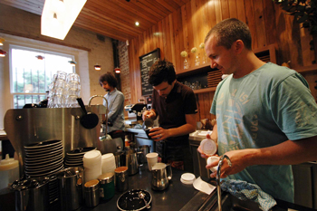 Part-owner of Three Bags Full, Nathan Toleman [right], says that finding good staff is one of the most important parts of a business