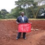Kenay man in field