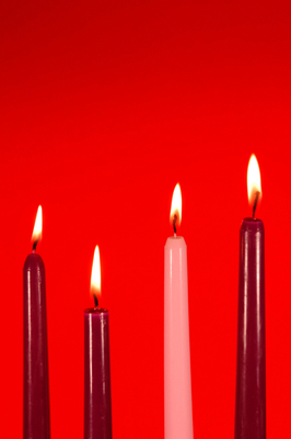 Four lit Advent candles