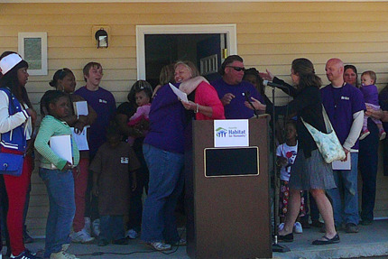 Wood family receives keys to their new house at Habitat for Humanity's Dedication on April 12, 2013. The Rev. Taylor Dinsmore, Good Samaritan, Knoxville, hugs LuAnn Wood just after giving her the keys to their new house and Caroline Vogel, also clergy at Good Samaritan, Knoxville, reaches out for Jeremiah Wood. Wood family receives keys to their new house at Habitat for Humanity's Dedication on April 12, 2013. The Rev. Taylor Dinsmore, Good Samaritan, Knoxville, hugs LuAnn Wood just after giving her the keys to their new house and Caroline Vogel, also clergy at Good Samaritan, Knoxville, reaches out for Jeremiah Wood.