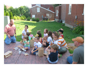 StJames VBS 2009 Photo 2 Pastor Jay Hodge of First Presbyterian, Shelbyville, speaks with children at Vacation Bible Camp