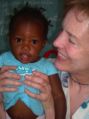 Melissa entertaining a child