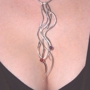 Lorilyn_modeling_riveted_necklace