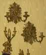 Pair of gilt bronze mask face sconces