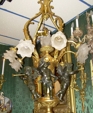 Gilt bronze & patinated cherub chandelier Gilt bronze & patinated cherub chandelier