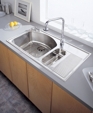 Culinaire™ Top Mount Dual Level Kitchen Sink with Drain Board
