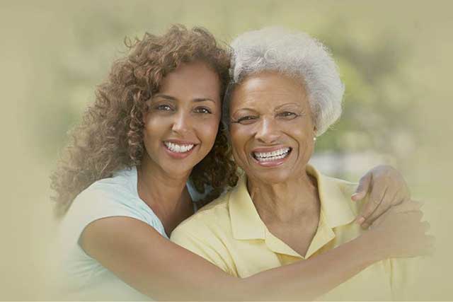 Mother and daughter, smiling