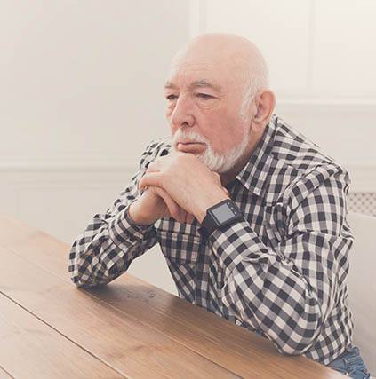 Man with Macular Degeneration, thinking