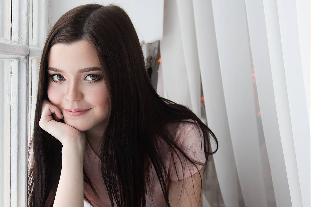 Teen Girl Smiling Window