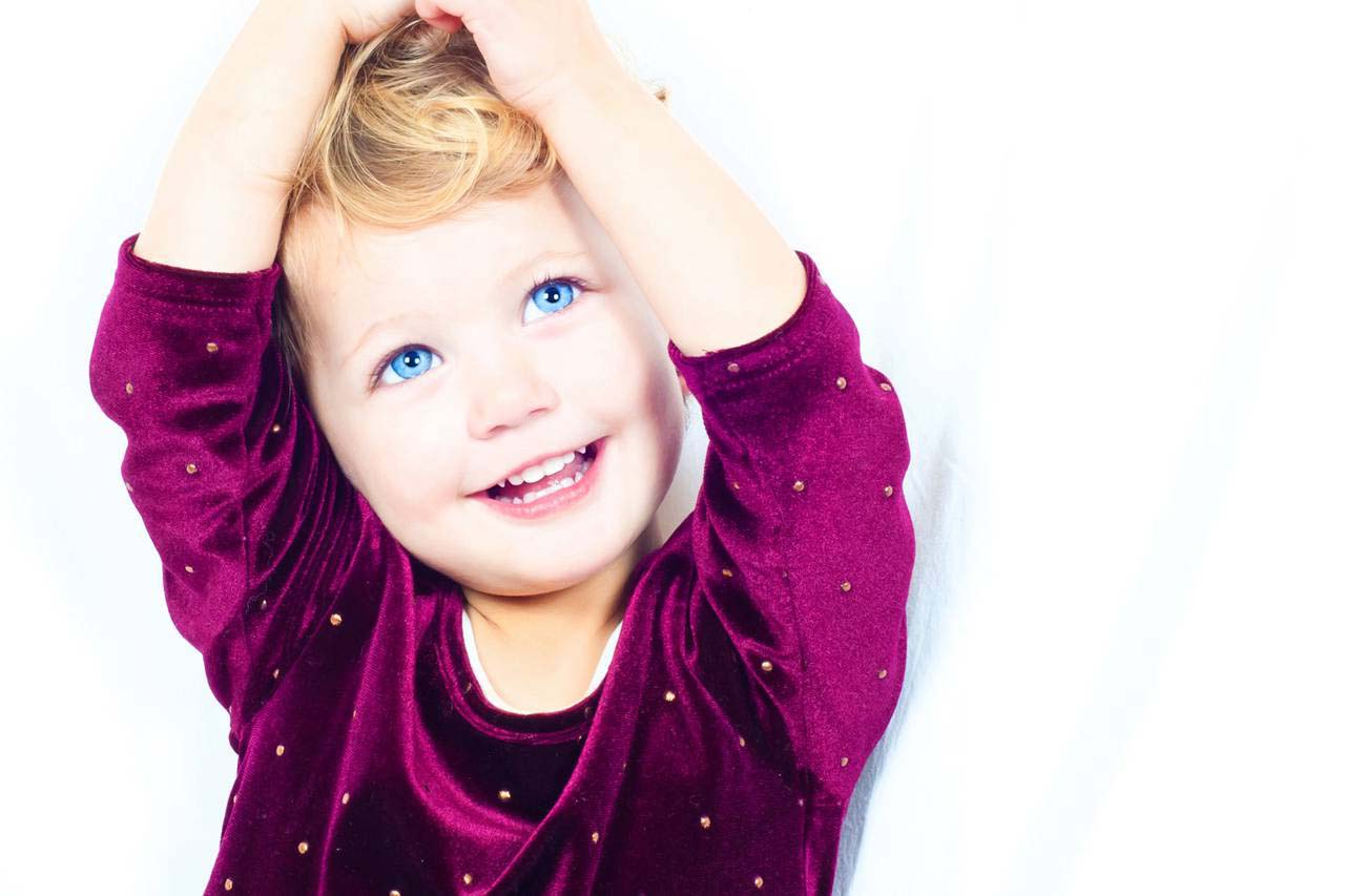 happy blue eyed girl smiling