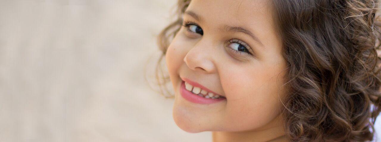 young child managing her myopia eye care